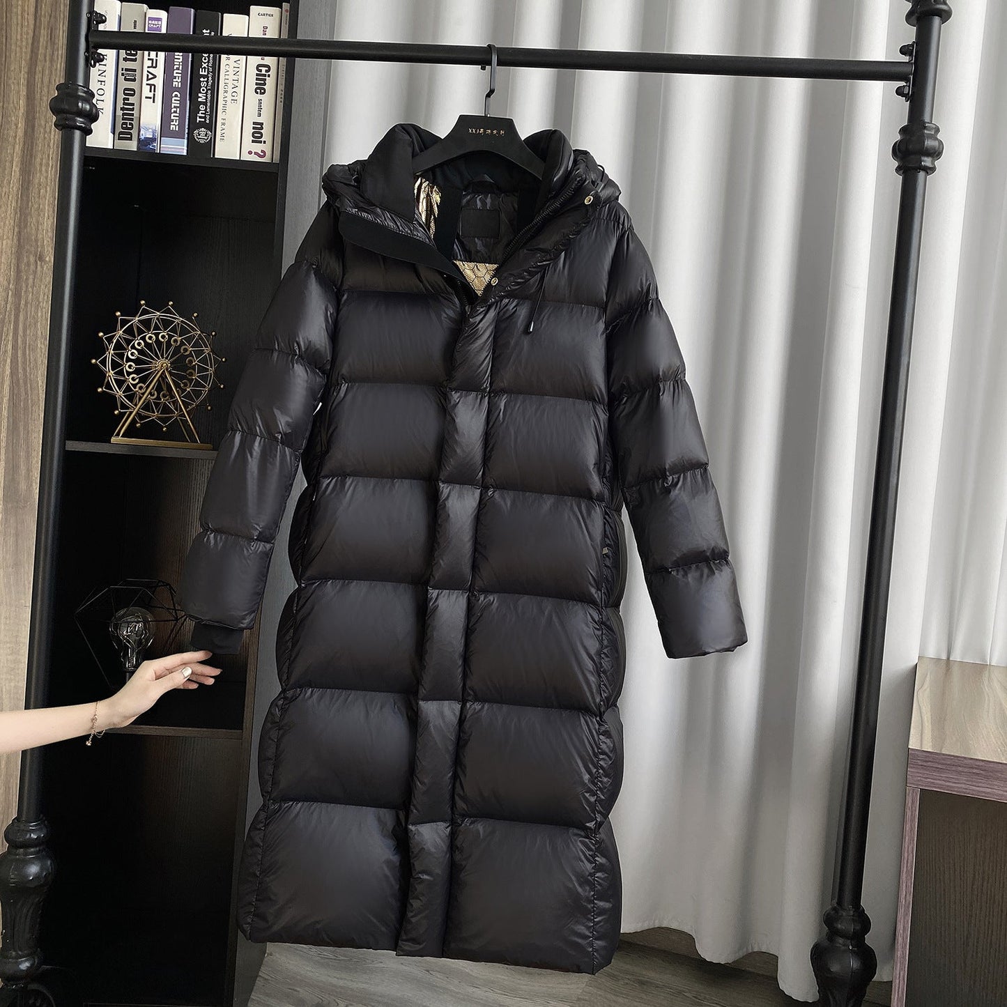 Extra-long quilted coat with hood and shiny finish