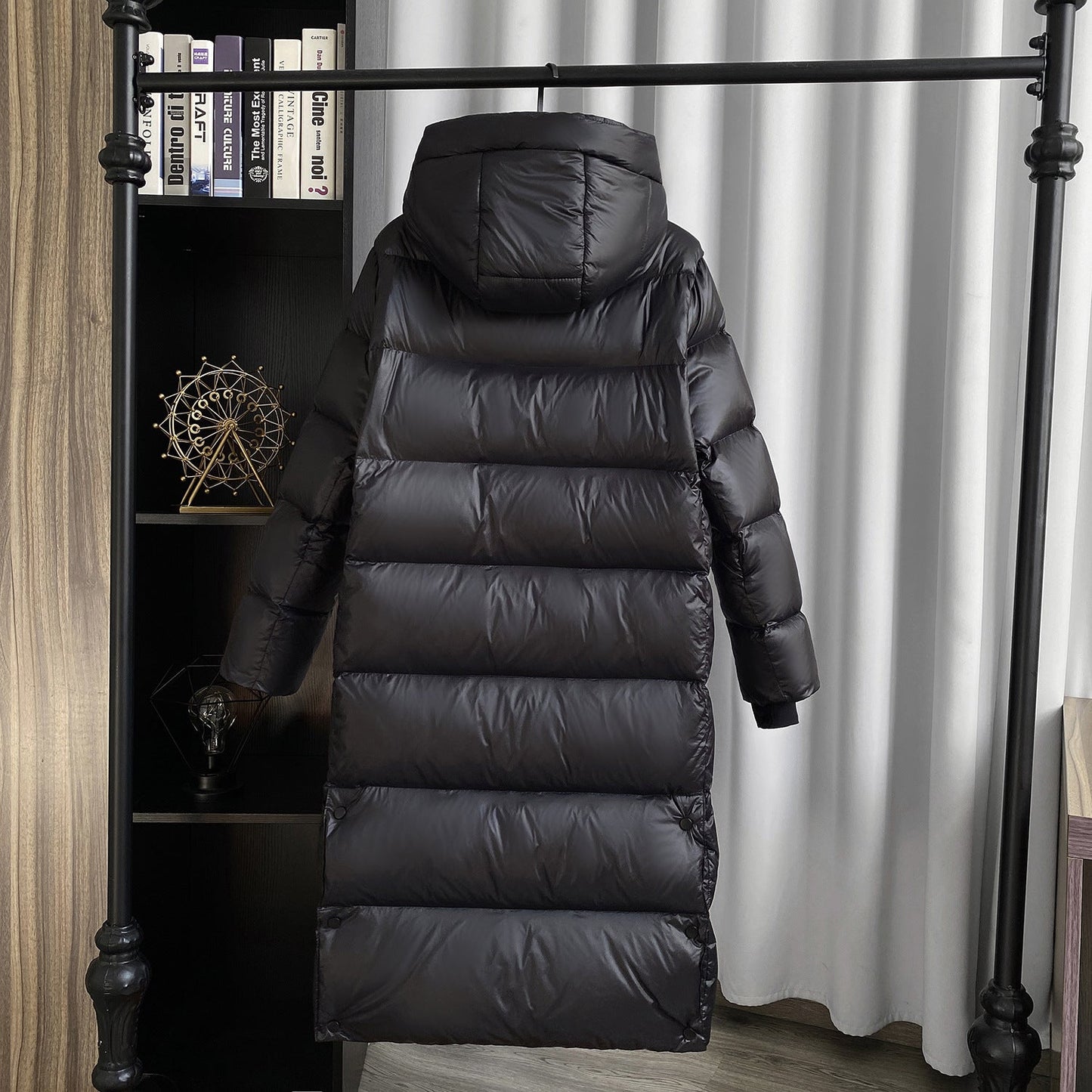 Extra-long quilted coat with hood and shiny finish