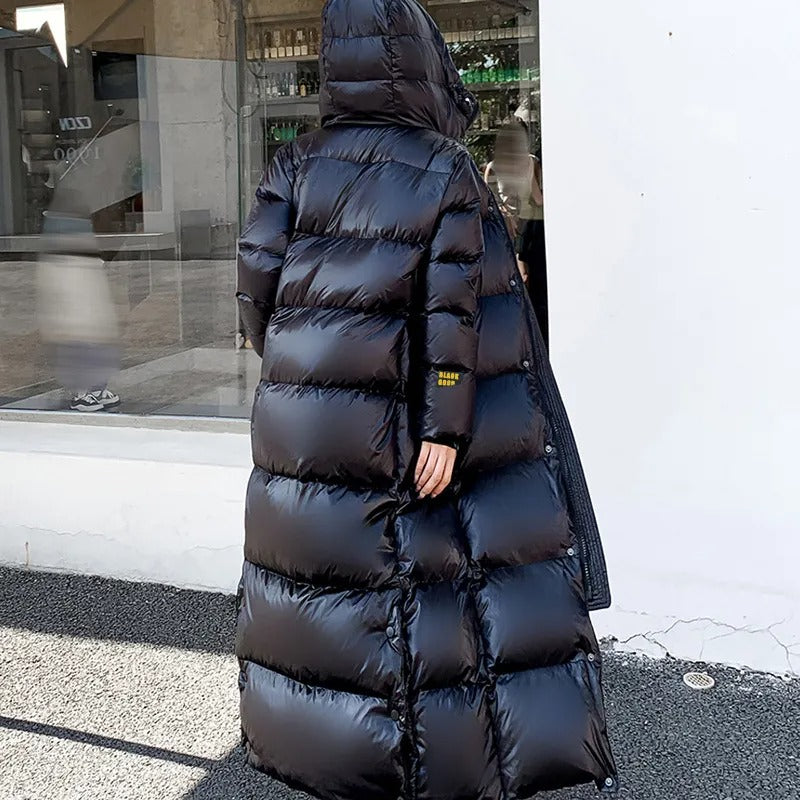 Extra-long quilted coat with hood and shiny finish