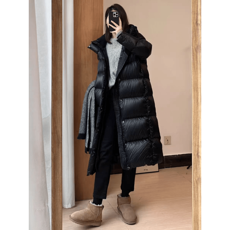 Extra-long quilted coat with hood and shiny finish