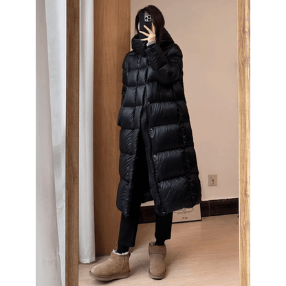 Extra-long quilted coat with hood and shiny finish